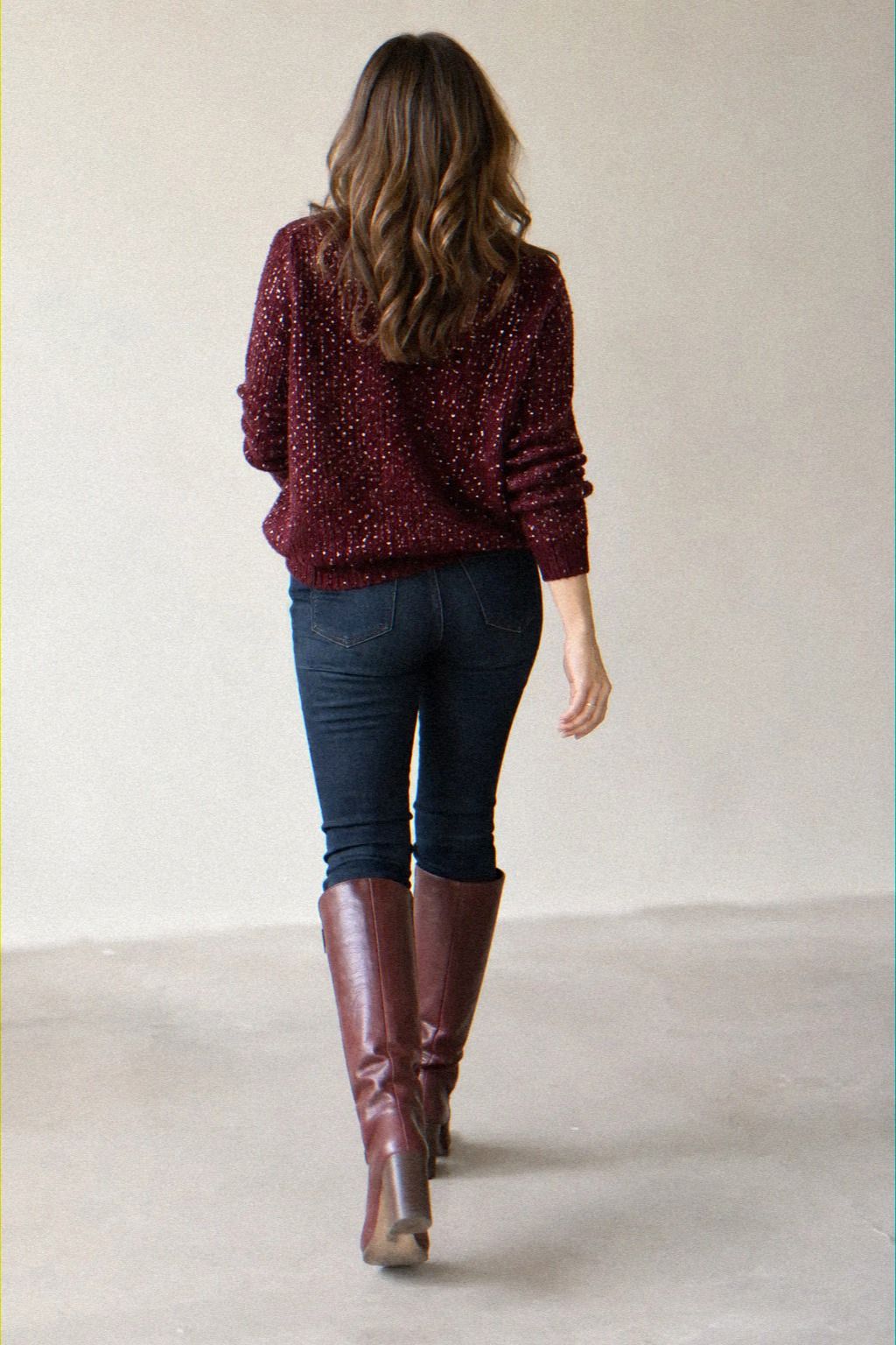 Ground a Sequin Sweater With Burgundy Boots