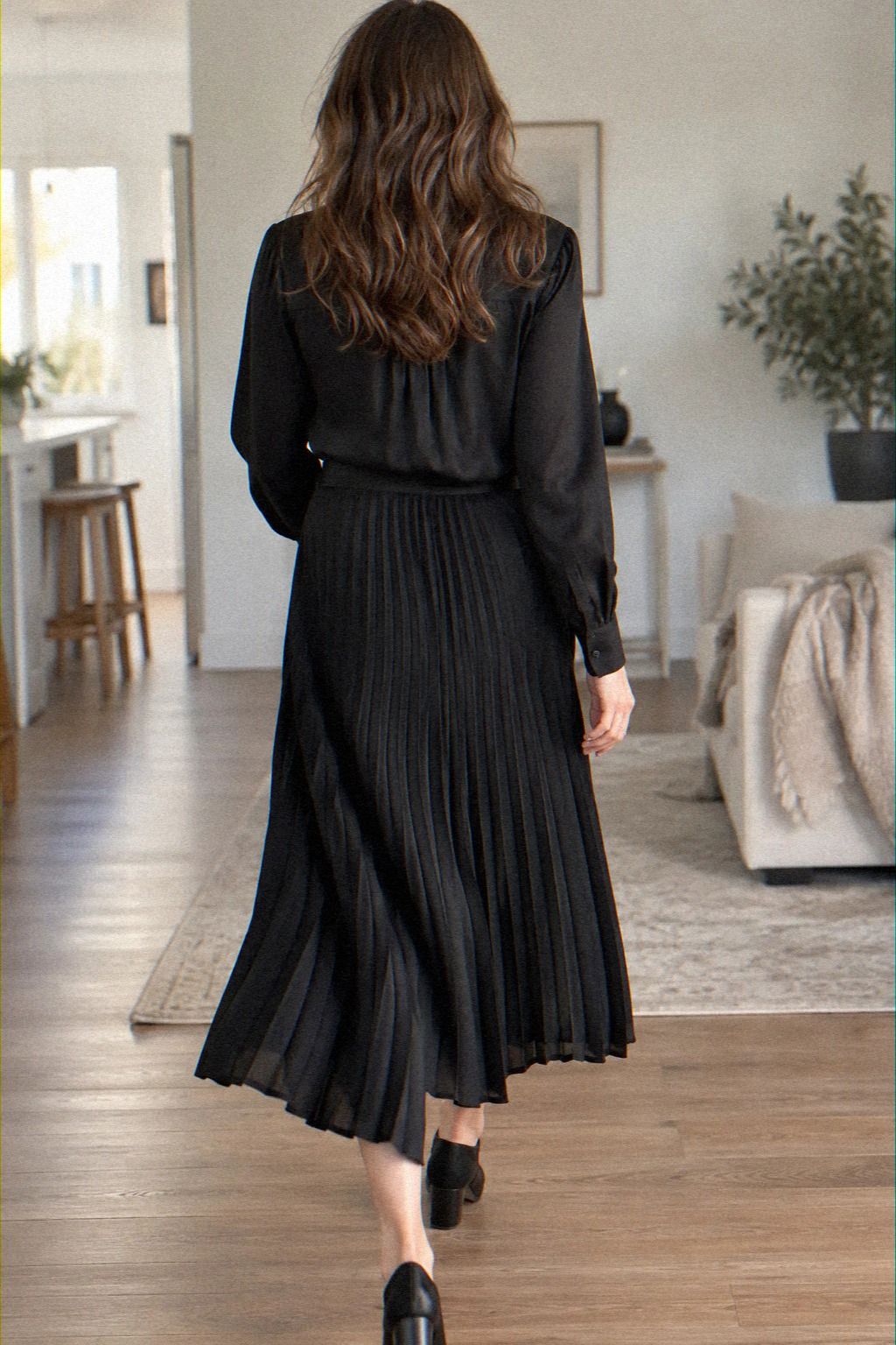 Black Pleated Skirt and Silk Blouse