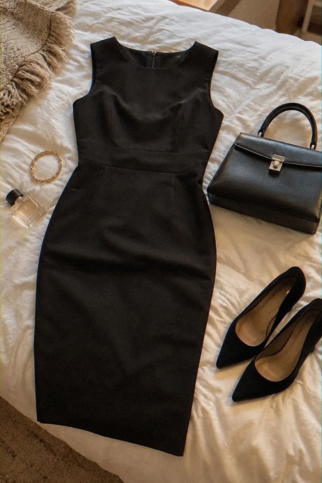 Is a Black Sheath Dress With a Structured Handbag Right for You?