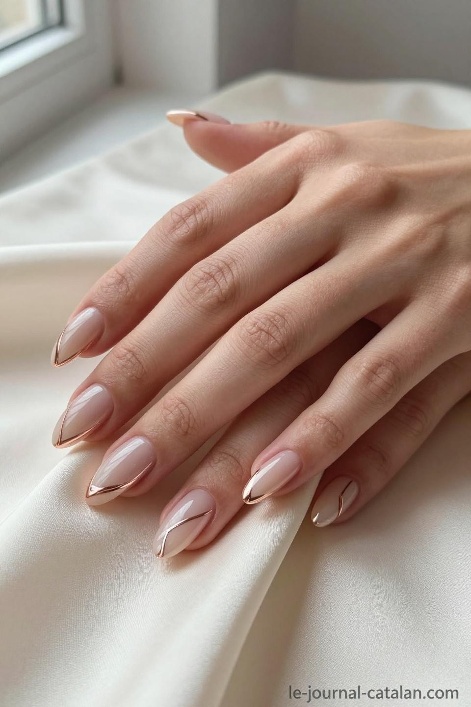 Almond Nails With Design featuring abstract rose gold line patterns