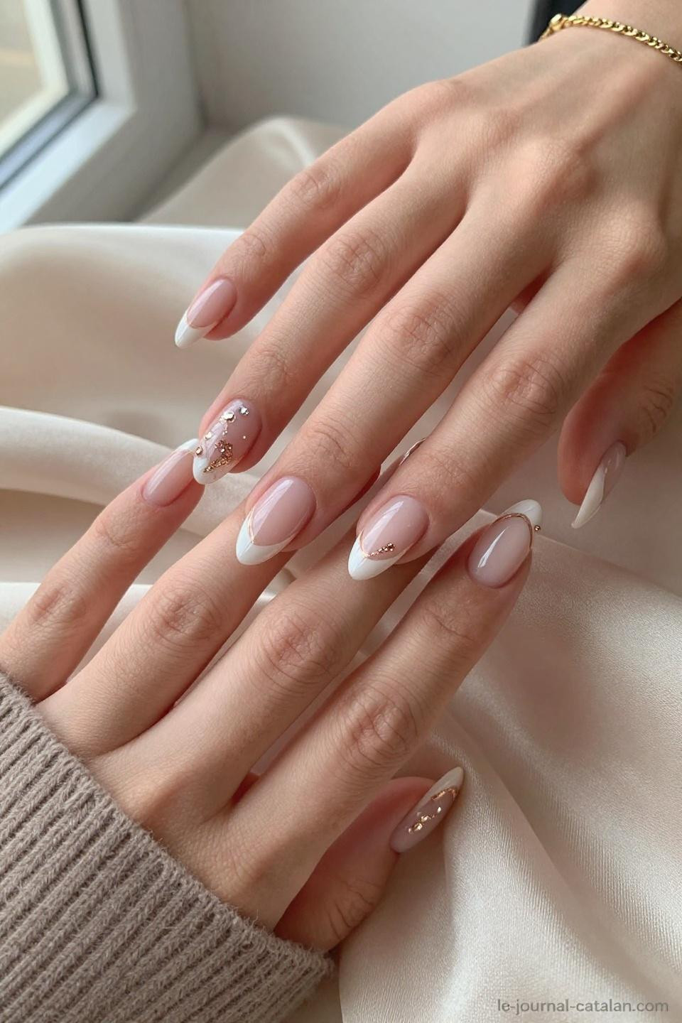 Classy Nails in nude pink with rose gold foil and crystal accents