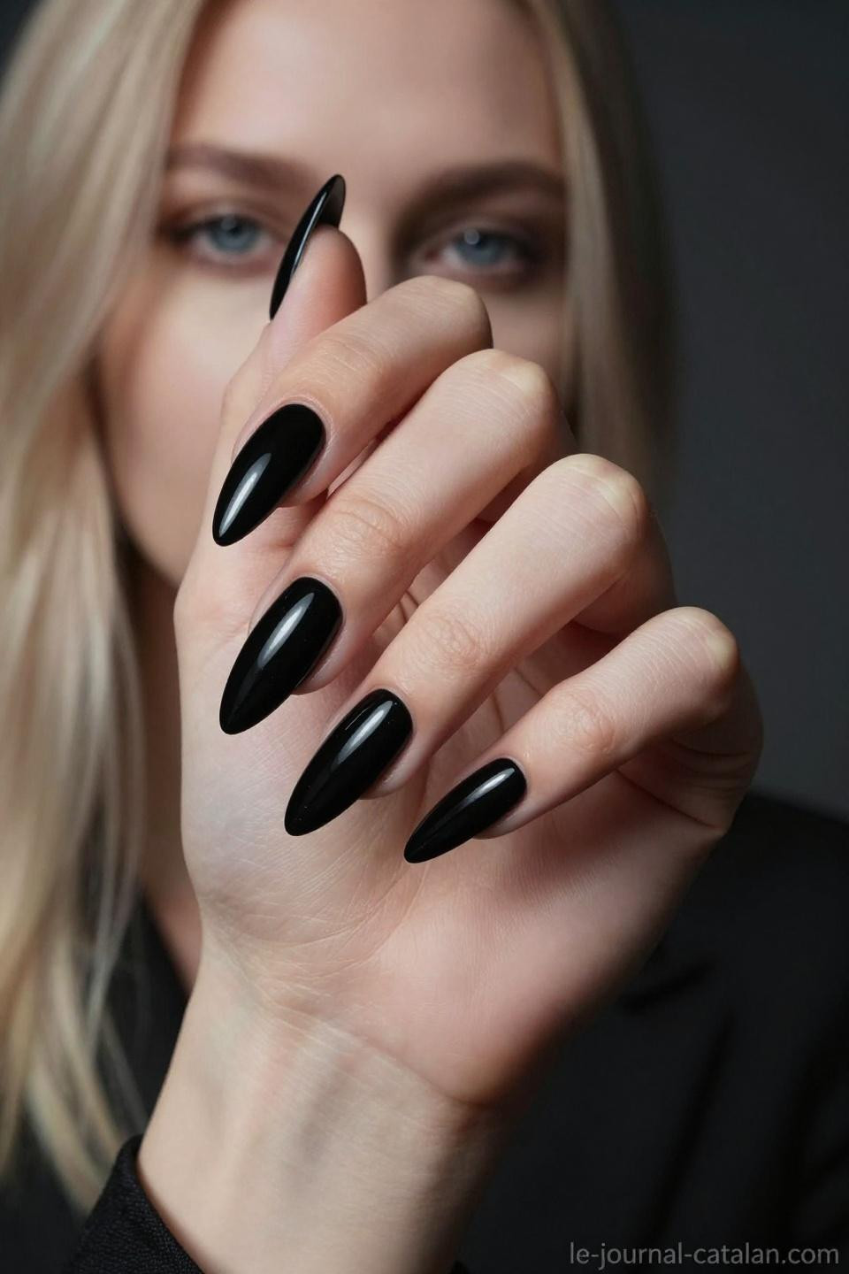 black nails ideas featuring almond shape with glossy finish on platinum blonde styling