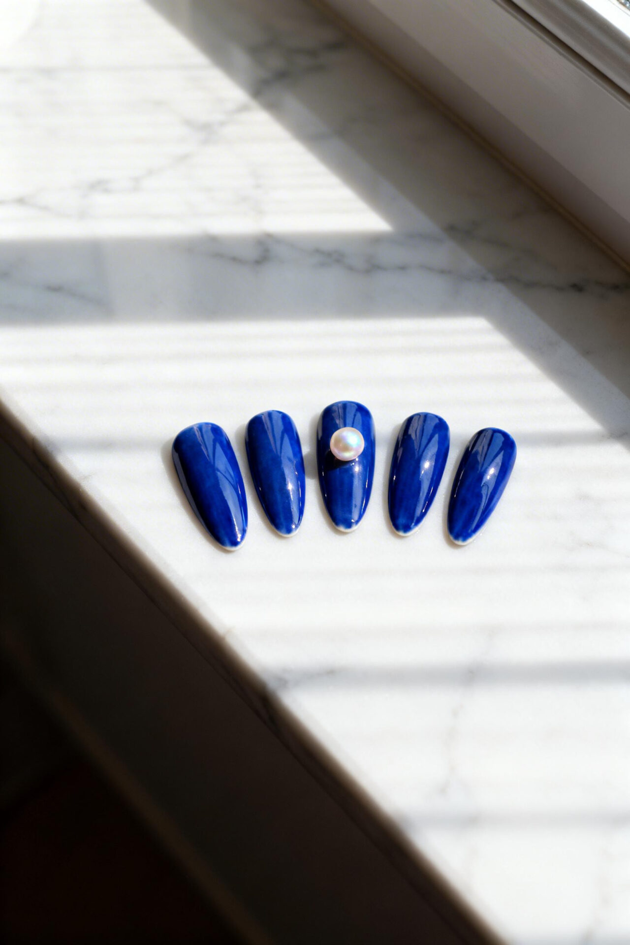 Royal blue glazed almond nails