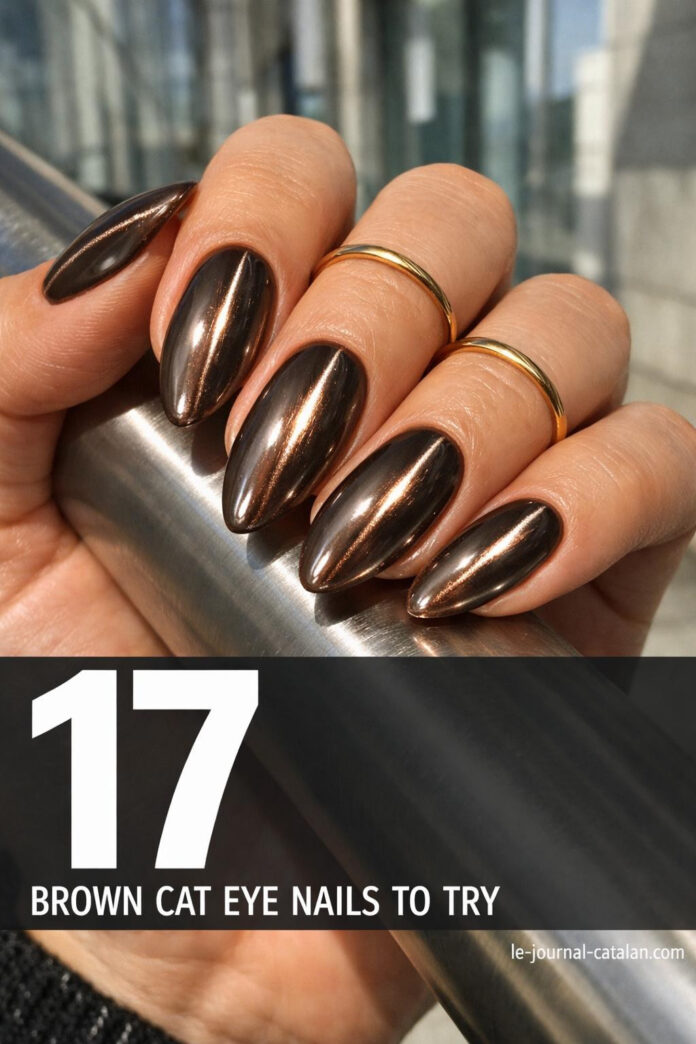 Brown Cat Eye Nails - Fall Cateye Design Fall cateye nails in rich brown tones with sleek linear chrome effect and warm neutral polish finish for autumn manicure inspiration