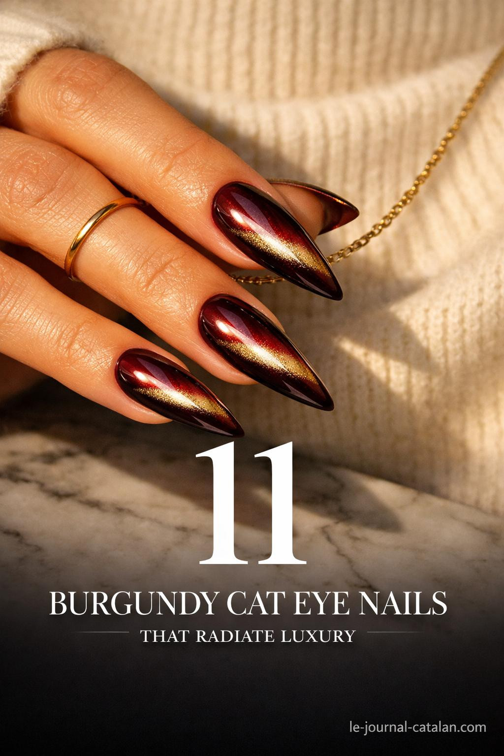 Red cat eye nail art featuring burgundy polish with sleek linear design and dark cherry red finish for feminine nail looks