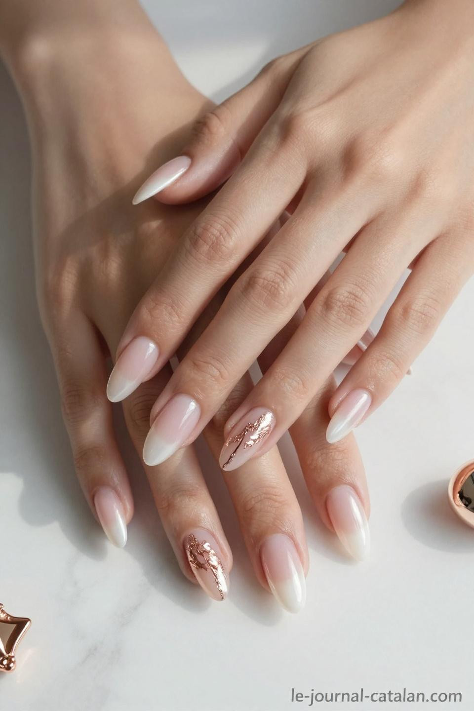 Pretty Almond Nails Classy ballet pink with rose gold foil details on porcelain hands