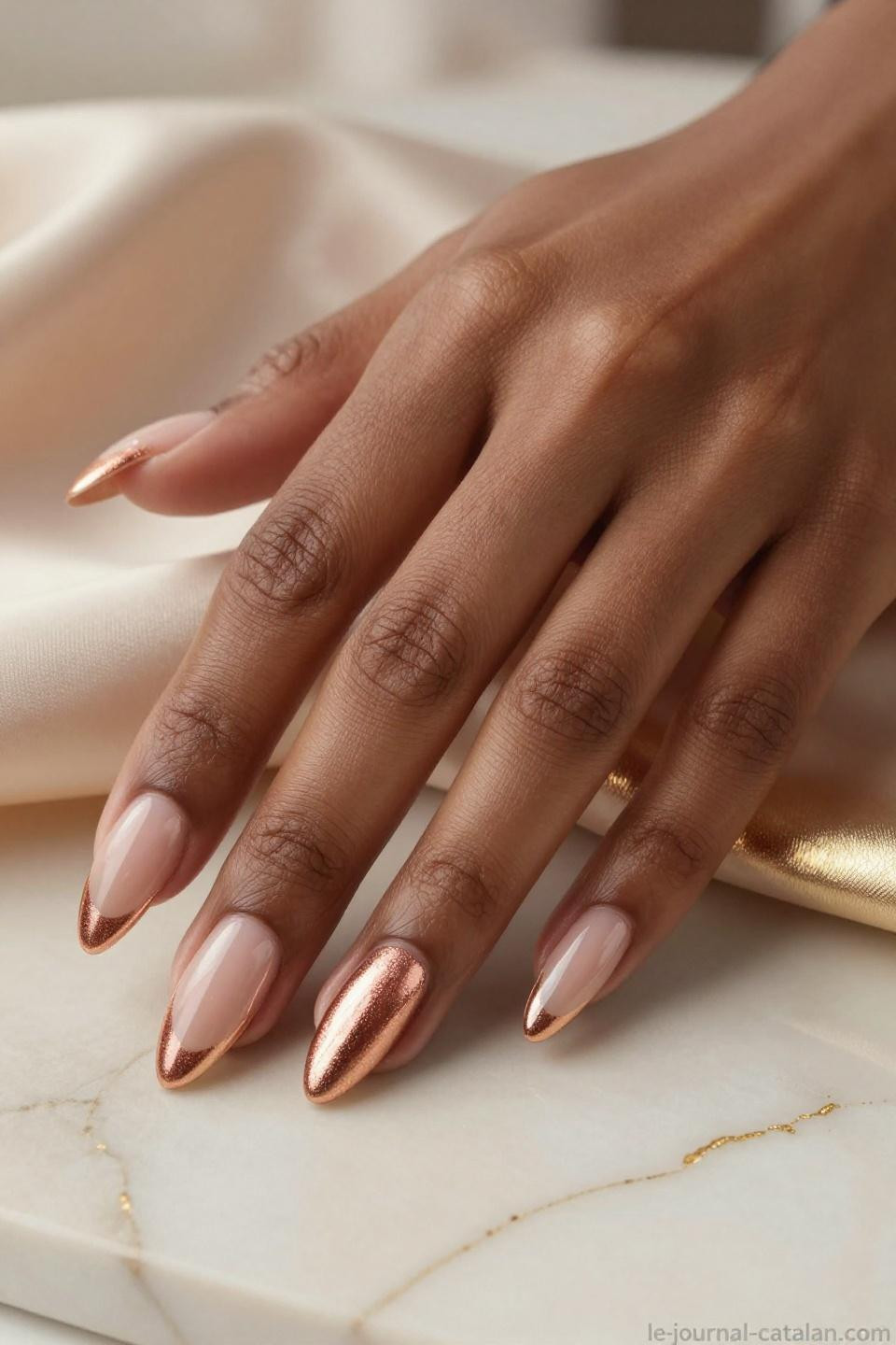 Pretty Almond Nails Classy rose gold chrome finish on deep mahogany skin