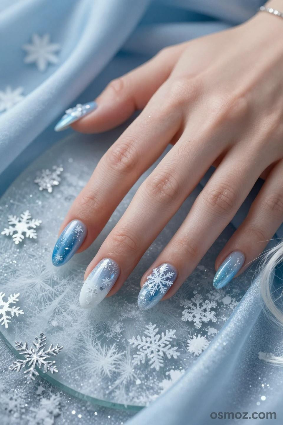 Frosty Blue Nails featuring glacial winter artistry