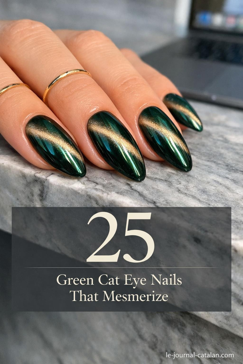 Blue cat eye nails with magnetic effect and glossy finish, showcasing emerald green polish with reflective stripe detail for elegant manicure inspiration