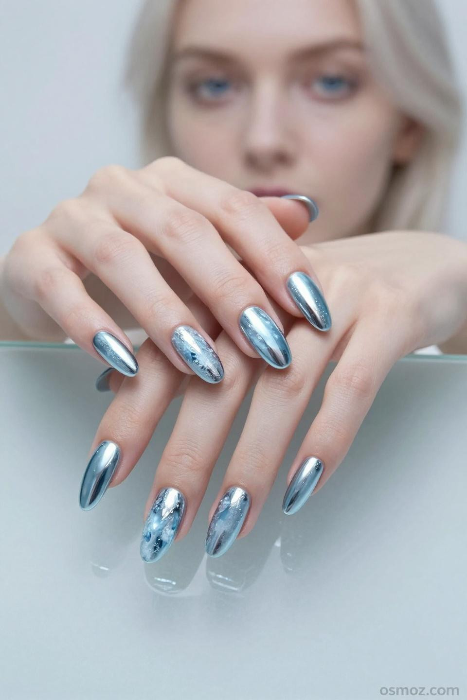 short blue chrome nails with practical length and mirror finish