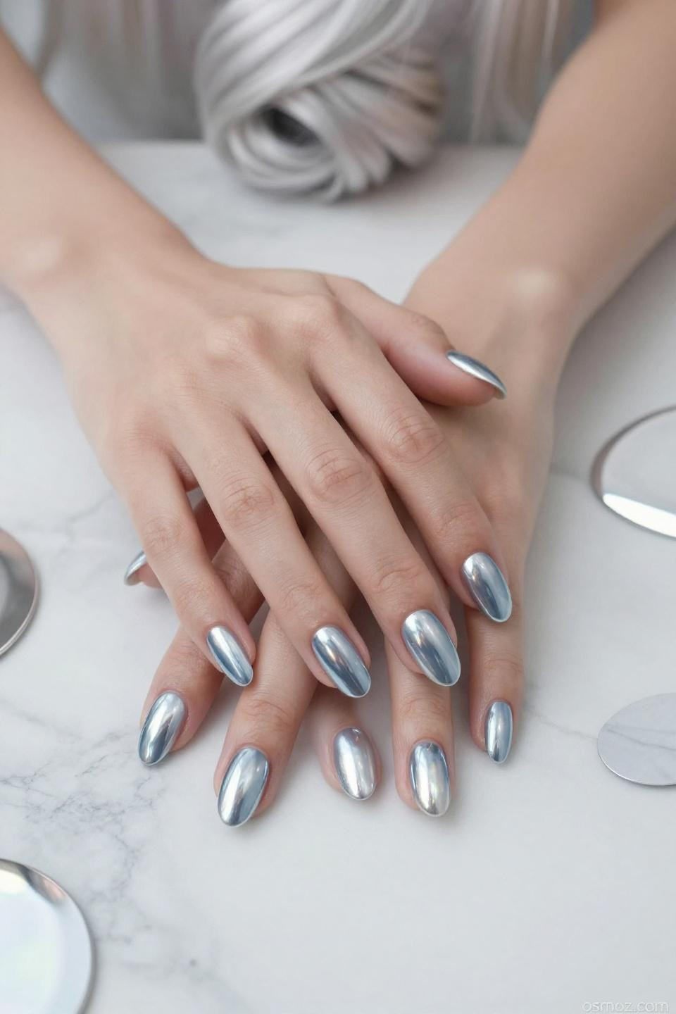 ice blue chrome nails with flawless mirror coating