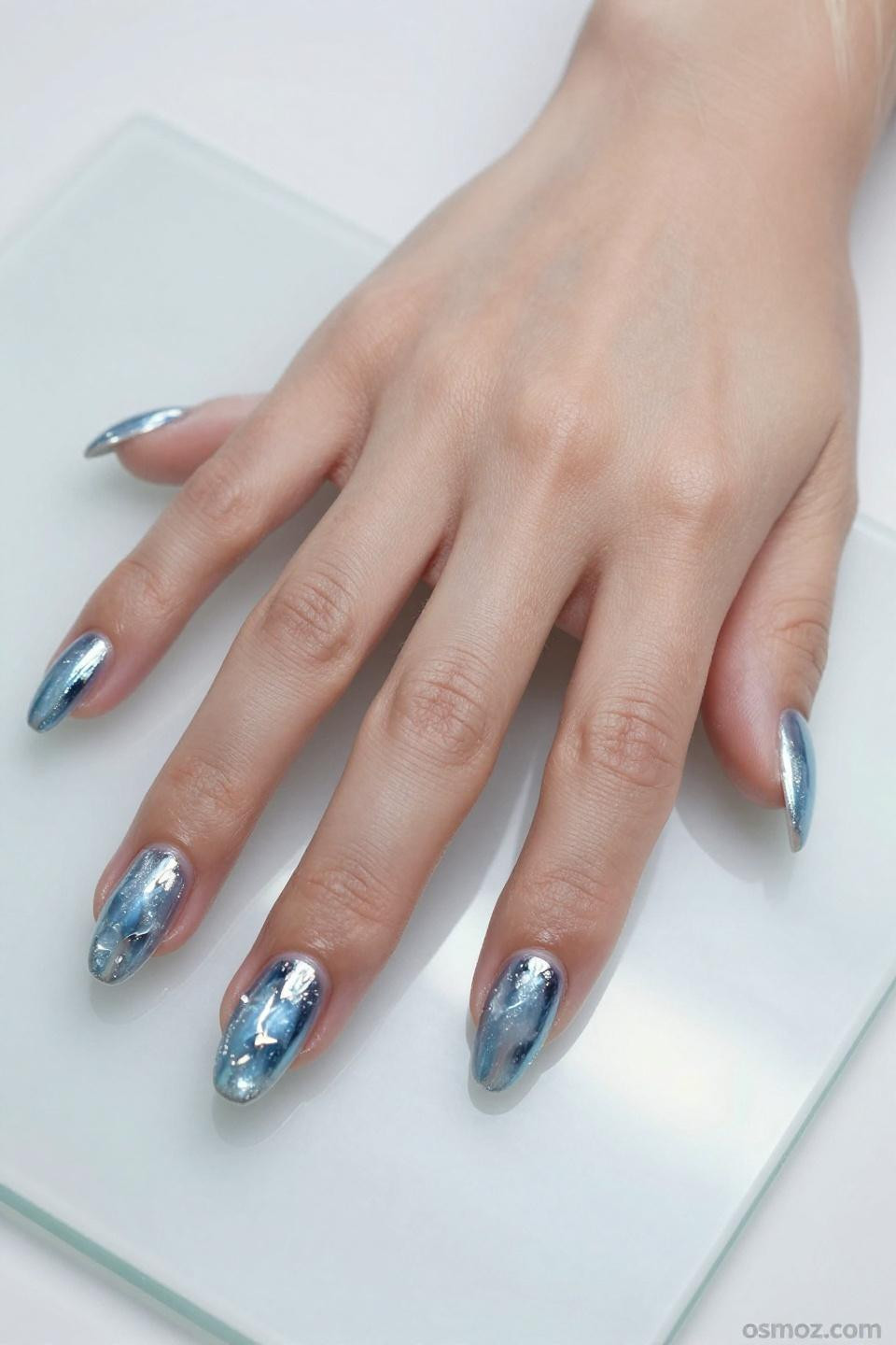 blue and silver chrome nails with dual-tone finish
