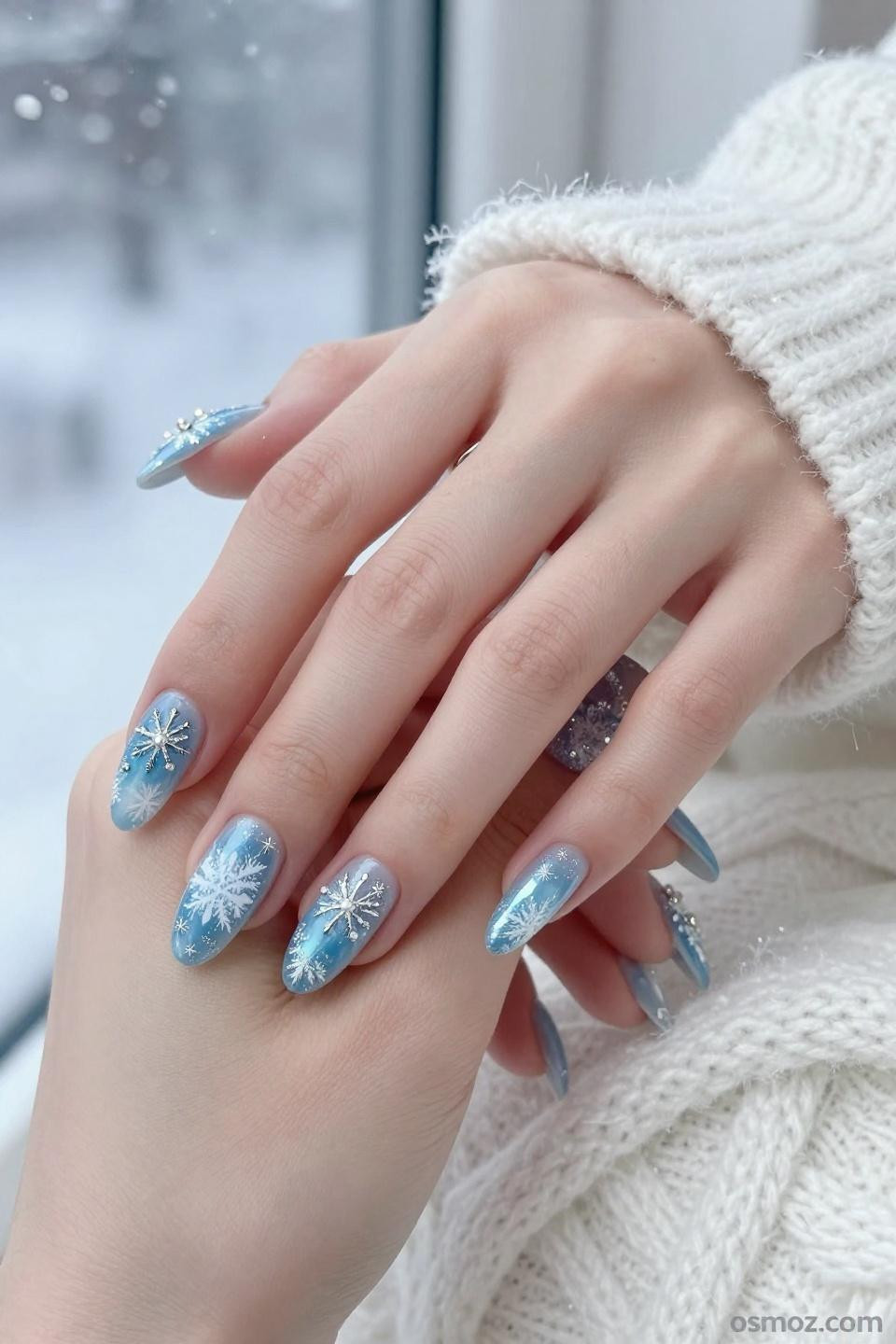 Blue And White Winter Nails with soft winter sky effects and cloud-like elegance