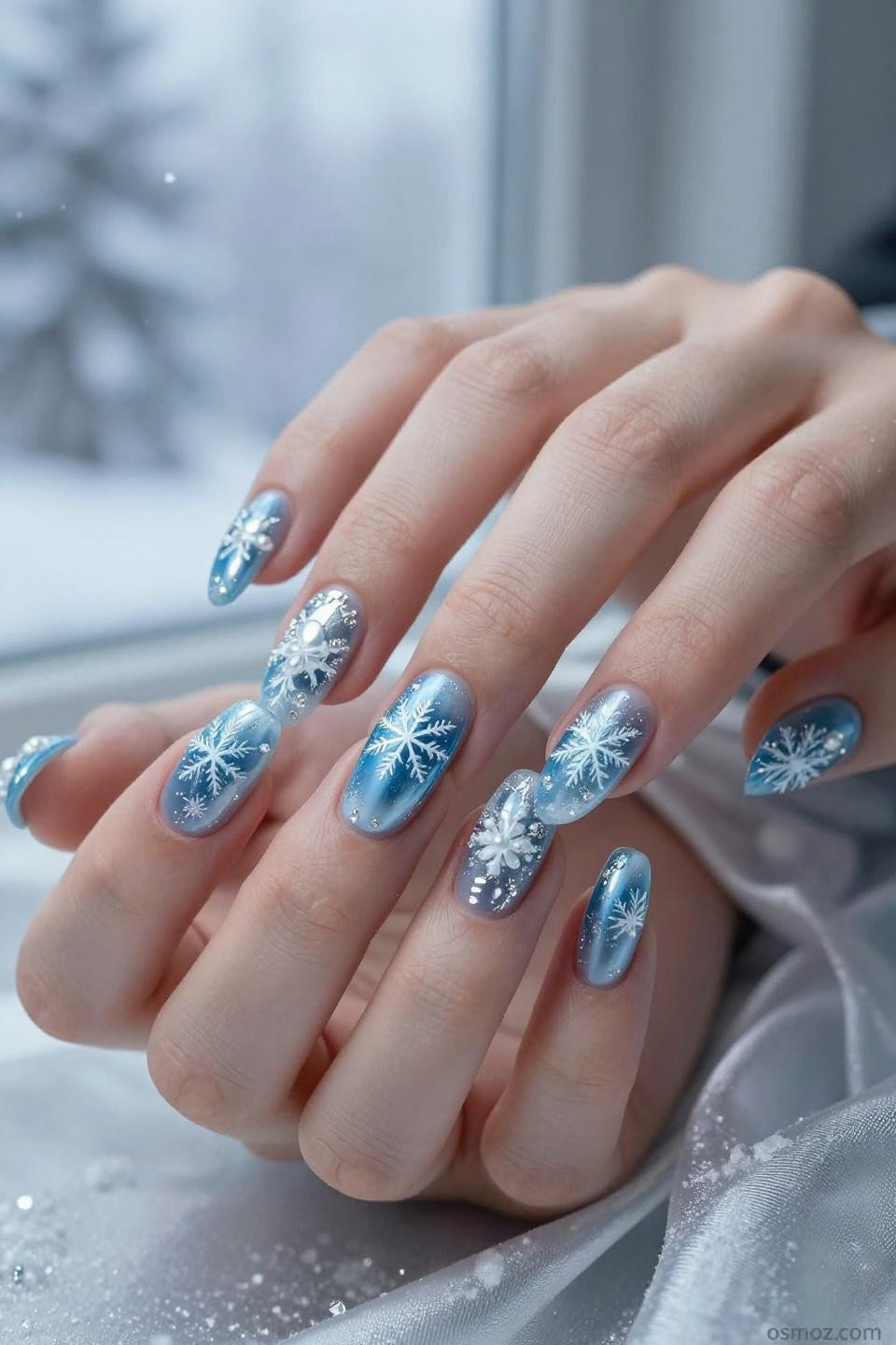 Frozen Inspired Nails featuring dramatic waterfall effects with flowing crystalline design