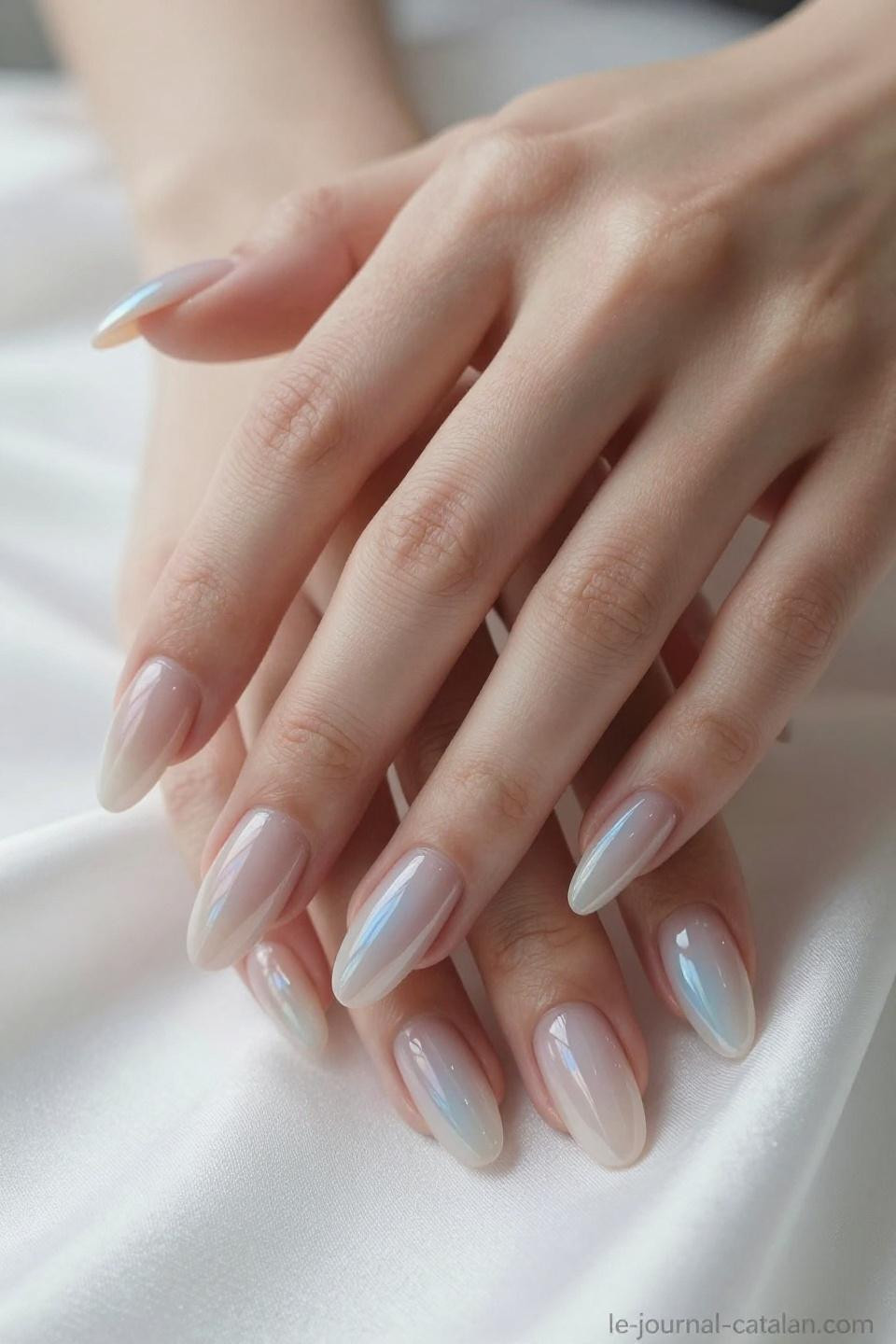 Elegant Almond Nails in sophisticated nude pink ombre with dimensional gel artistry