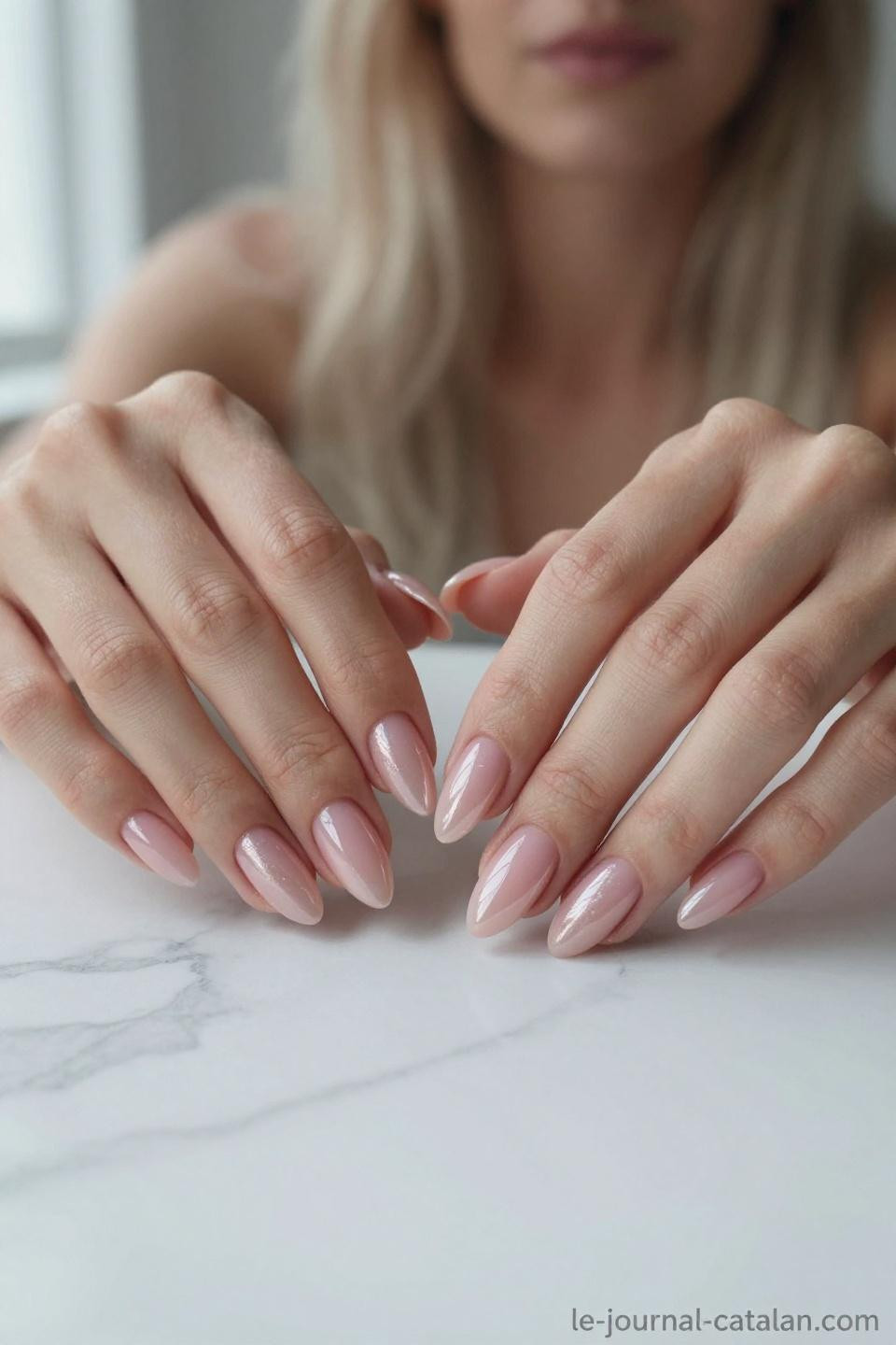 Almondetto Nails with rose quartz pink gel and pearl shimmer on extended almond shape