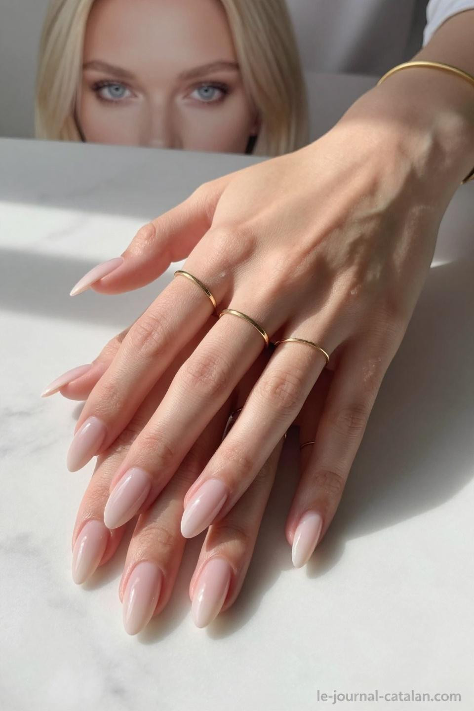 Long Almond Nails in glossy nude pink with professional salon precision