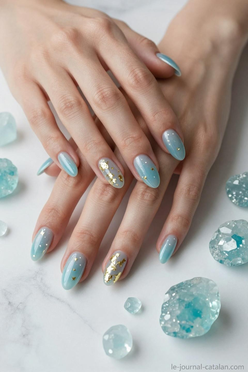 March Birthday Nails Ideas featuring translucent aquamarine with gold Pisces constellation