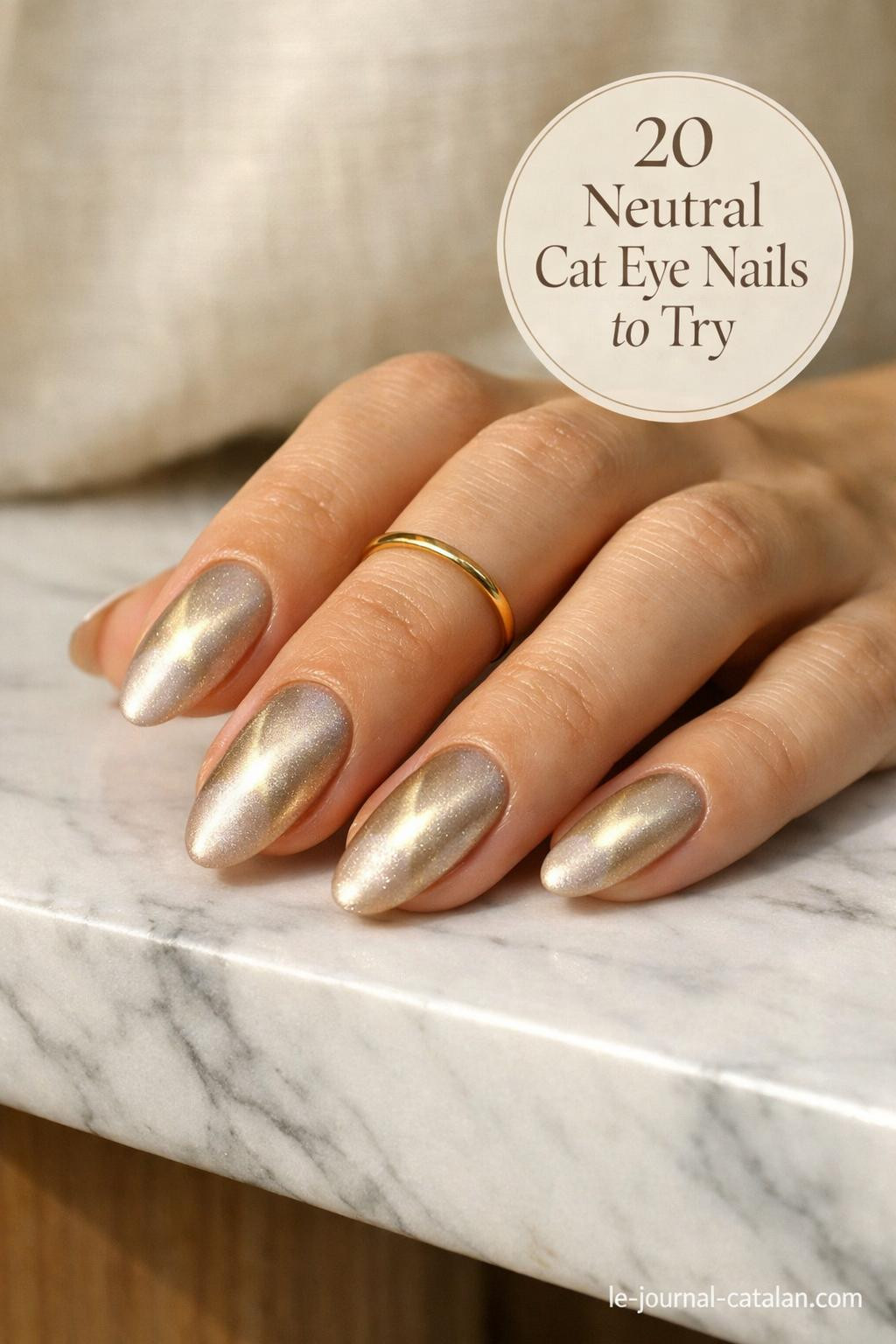 Cute cat eye nail design in beige and champagne tones with a sleek linear finish and minimalist style for spring