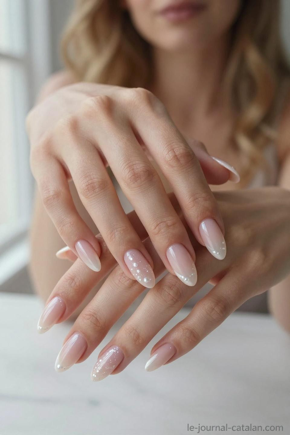 Almond Nails With Design featuring opalescent pearl and rose gold chrome gradient