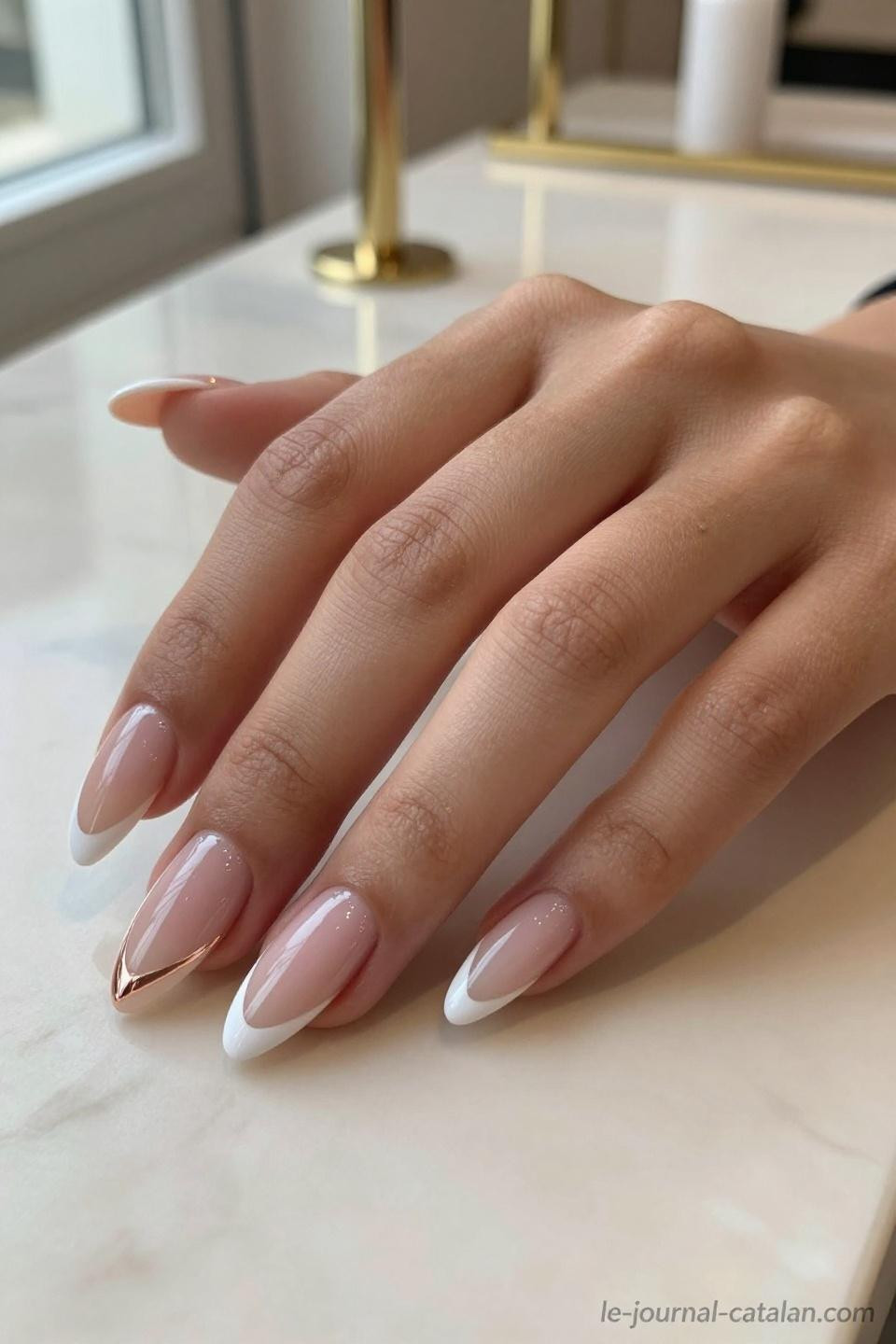 Almond French Tip Nails featuring minimalist white tips with precise application