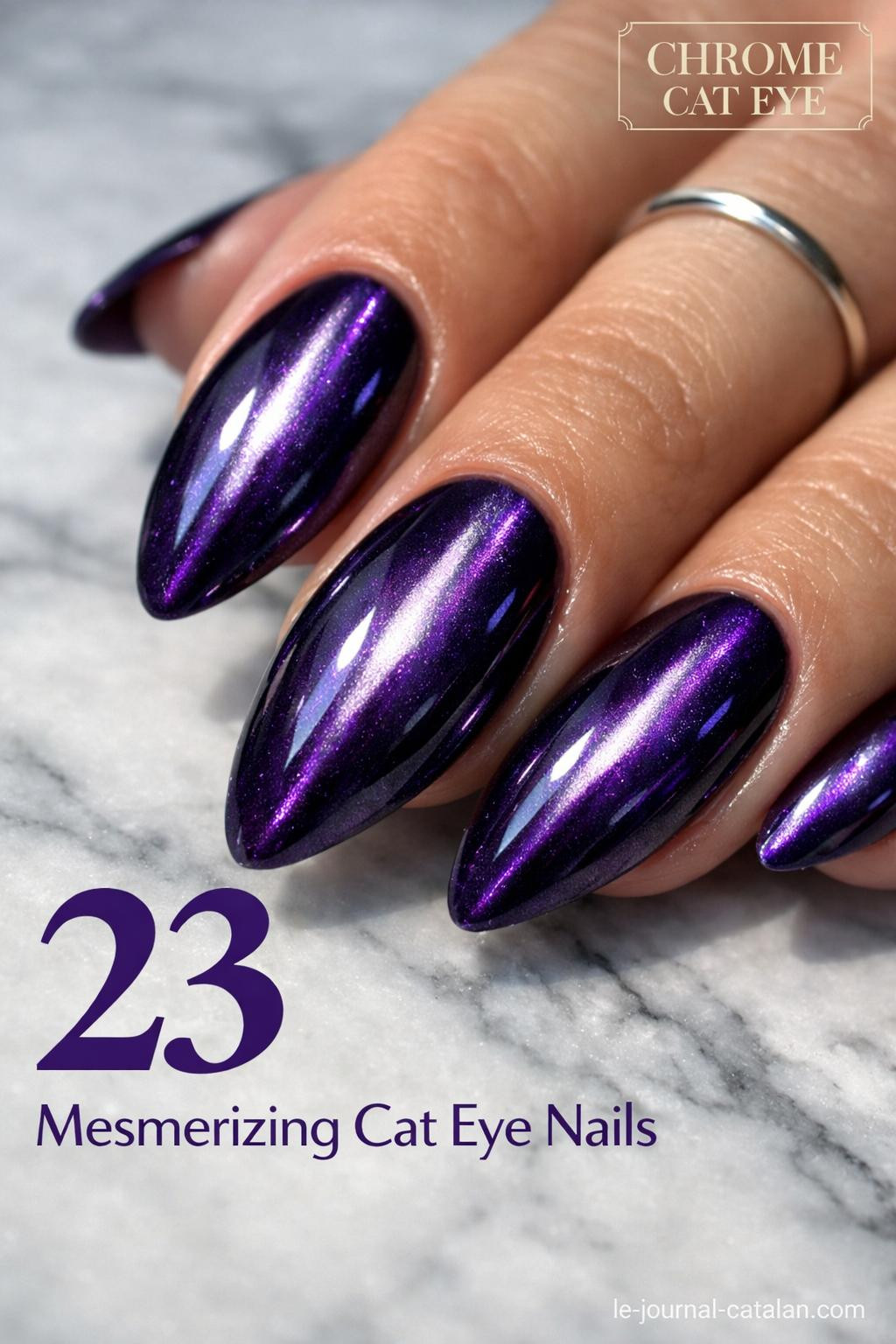 Cute cat eye nails in purple with magnetic effect creating a sleek feline stripe design on acrylic nail tips