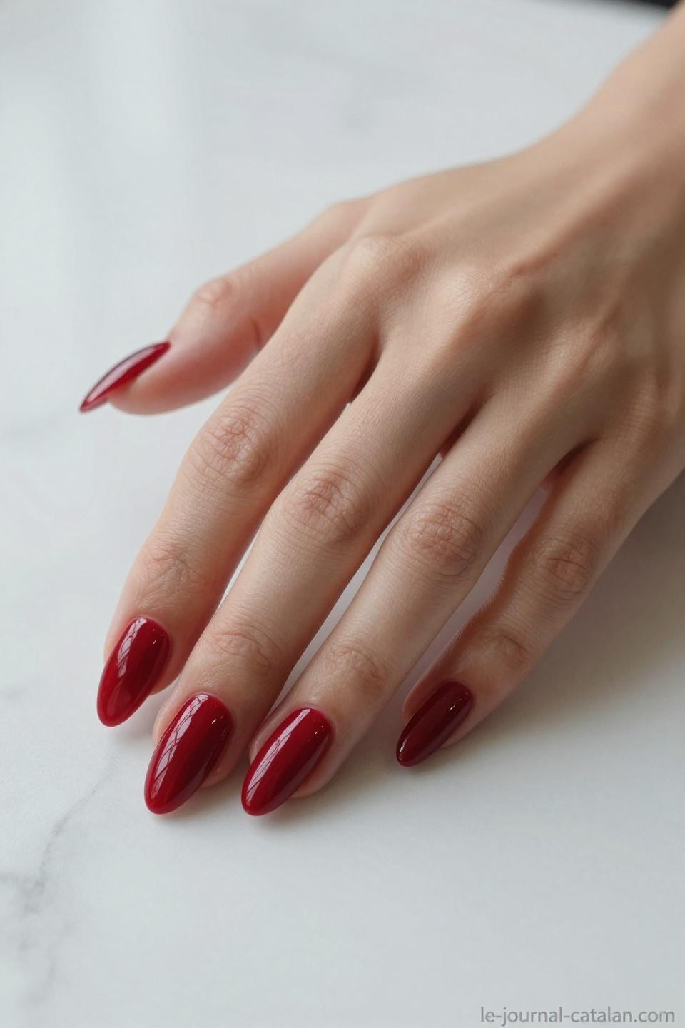 Red Almond Nails classic cherry red high gloss gel manicure