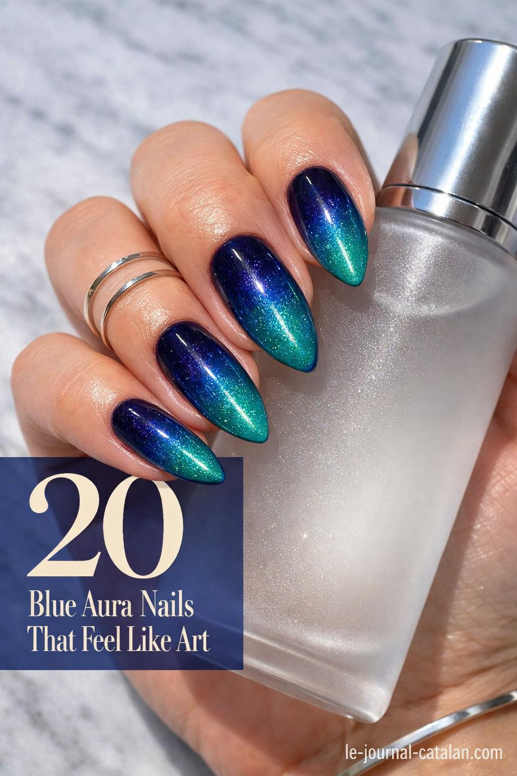 Dark blue aura nails featuring chrome finish with iridescent shimmer effect and gradient blue tones for modern nail art inspiration